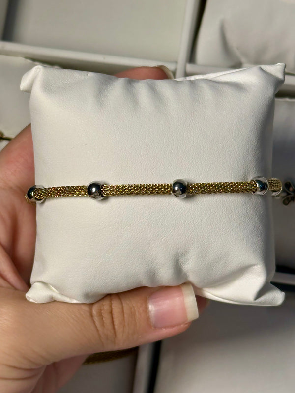 Gold with silver ball