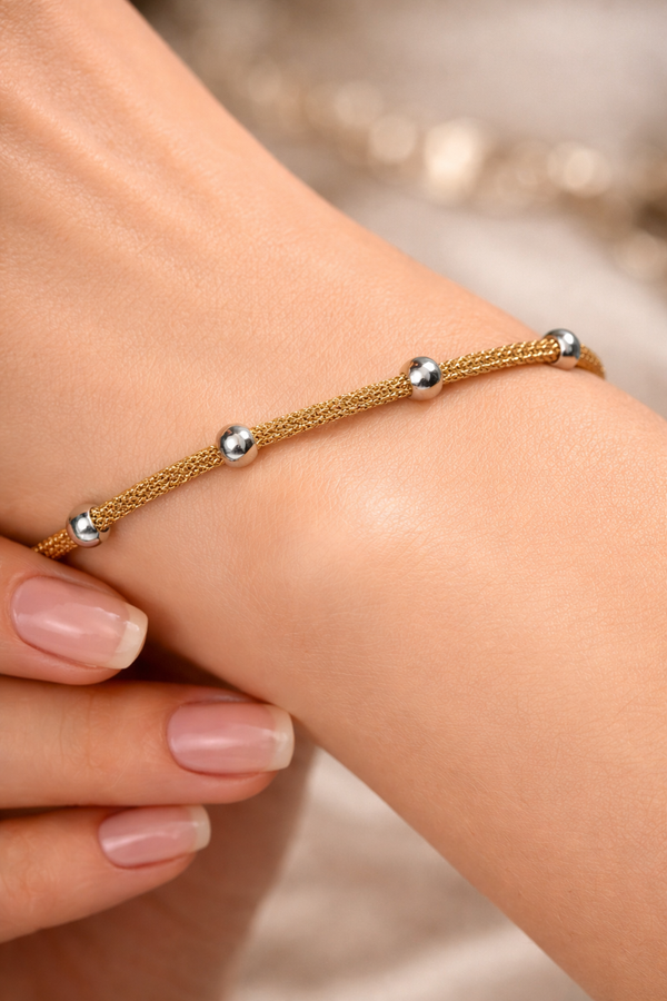 Gold with silver ball