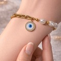 Blue eye in white bracelet