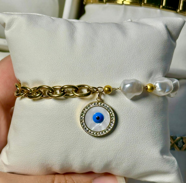 Blue eye in white bracelet