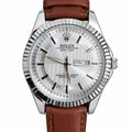 Men's Silver-Tone Fluted Bezel Day-Date Watch – Brown Strap. Textured silver dial, fluted bezel, day-and-date window, and stitched brown leather-look strap.