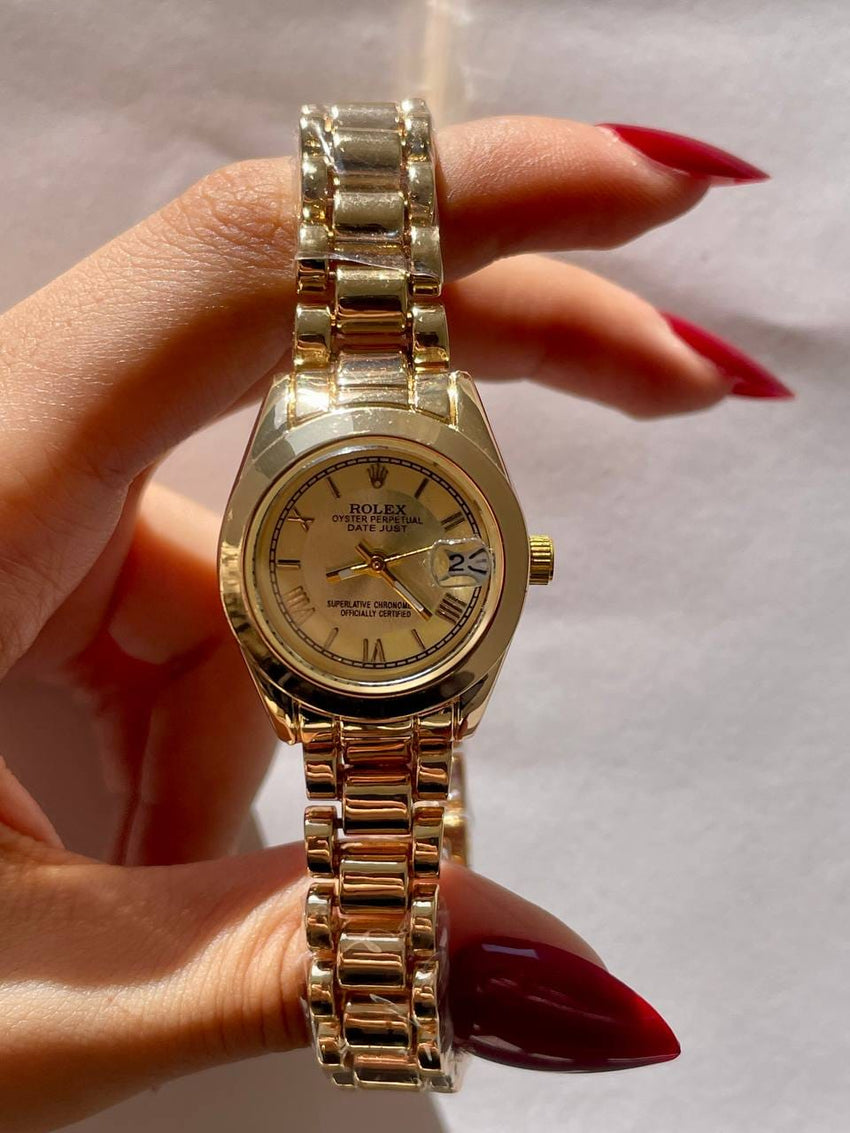 Mini rolex in gold