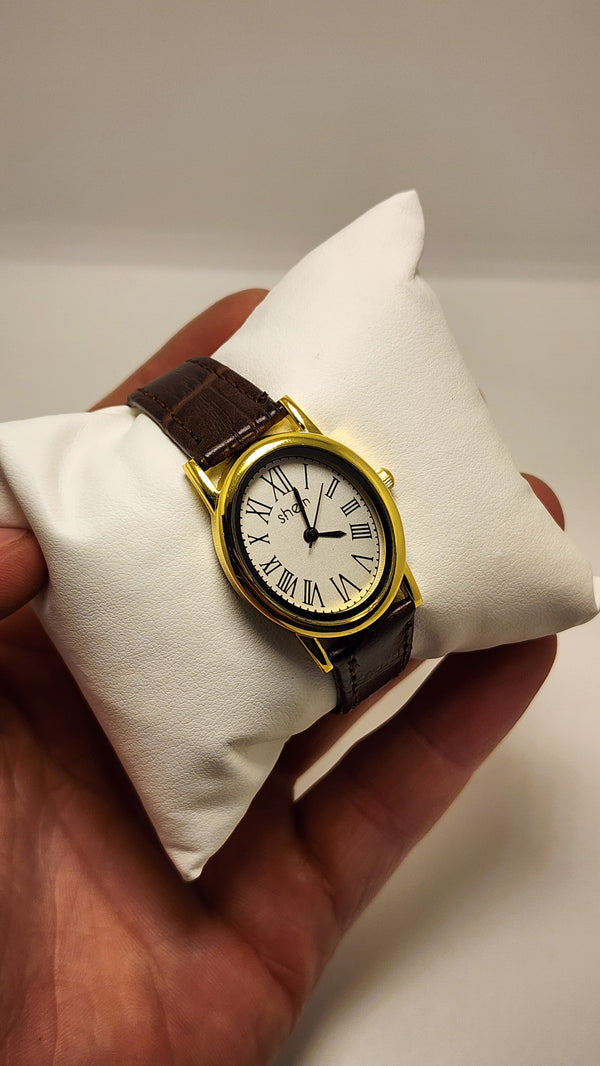 Shein in brown circle