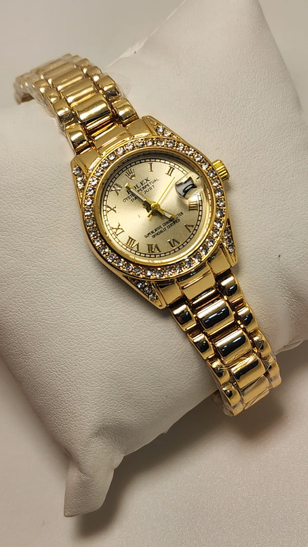 Mini rolex in gold
